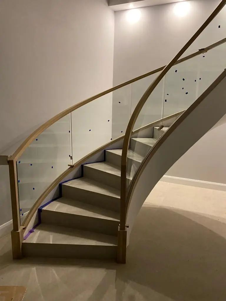 Curved timber and glass stair installation